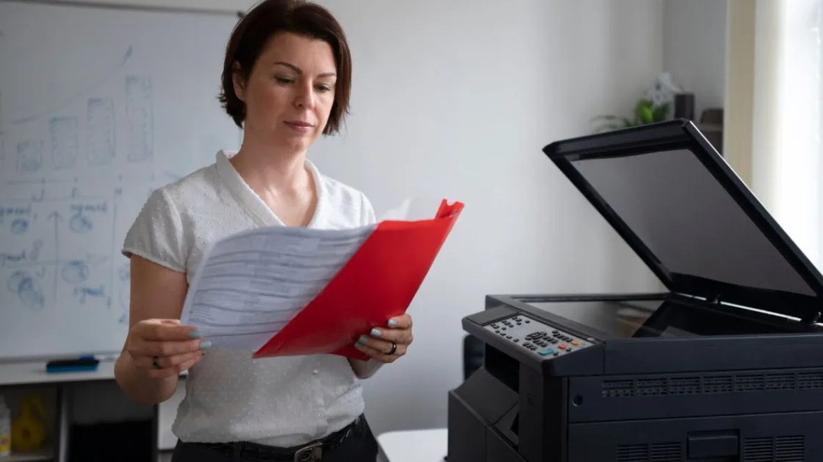woman-working-office-using-printer