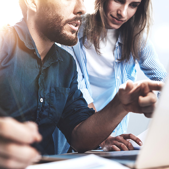 group of colleagues in meeting