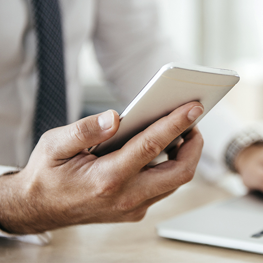 Hand holding smartphone