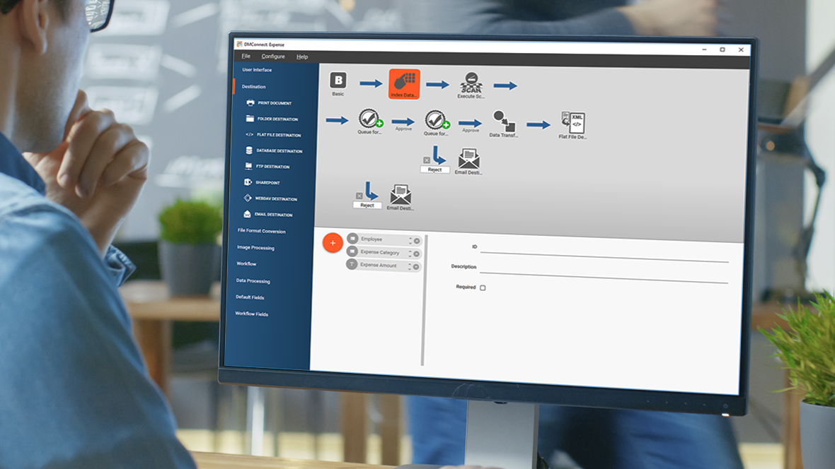 Man looking at computer monitor