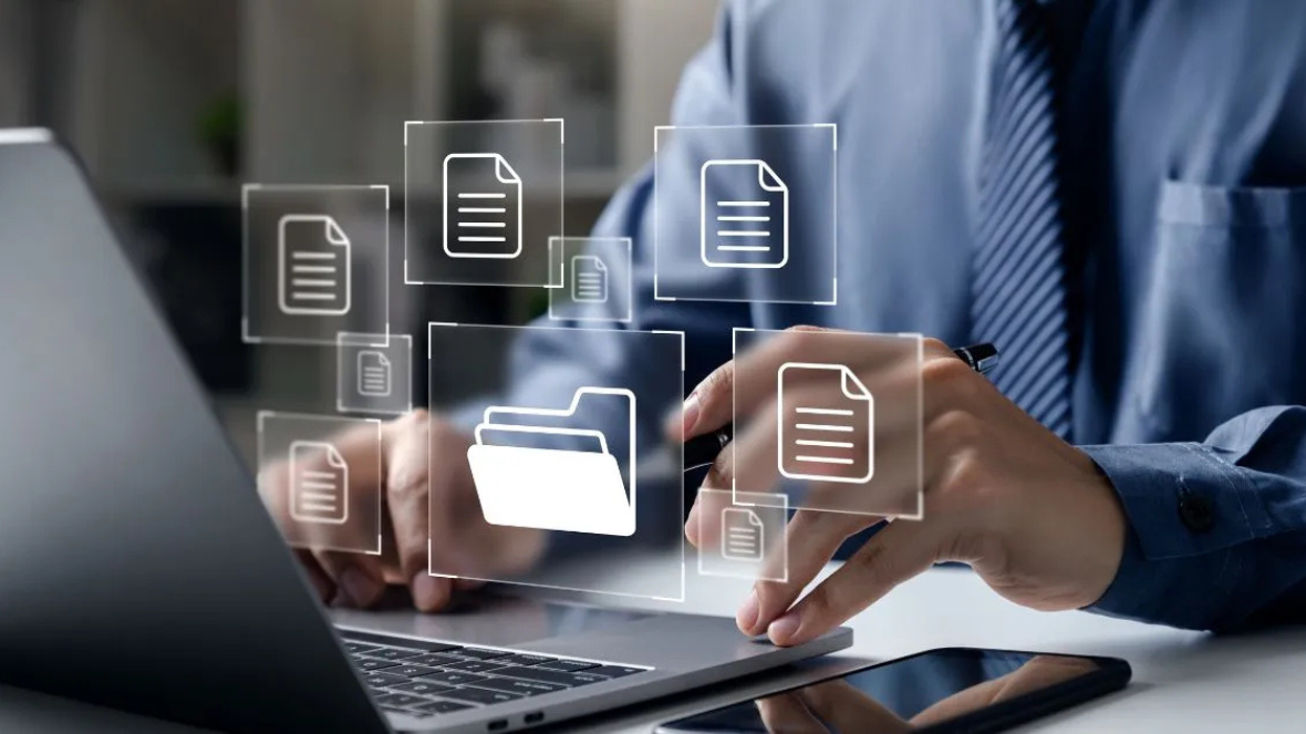 businessman-pointing-folder-document businessman-pointing-folder-document