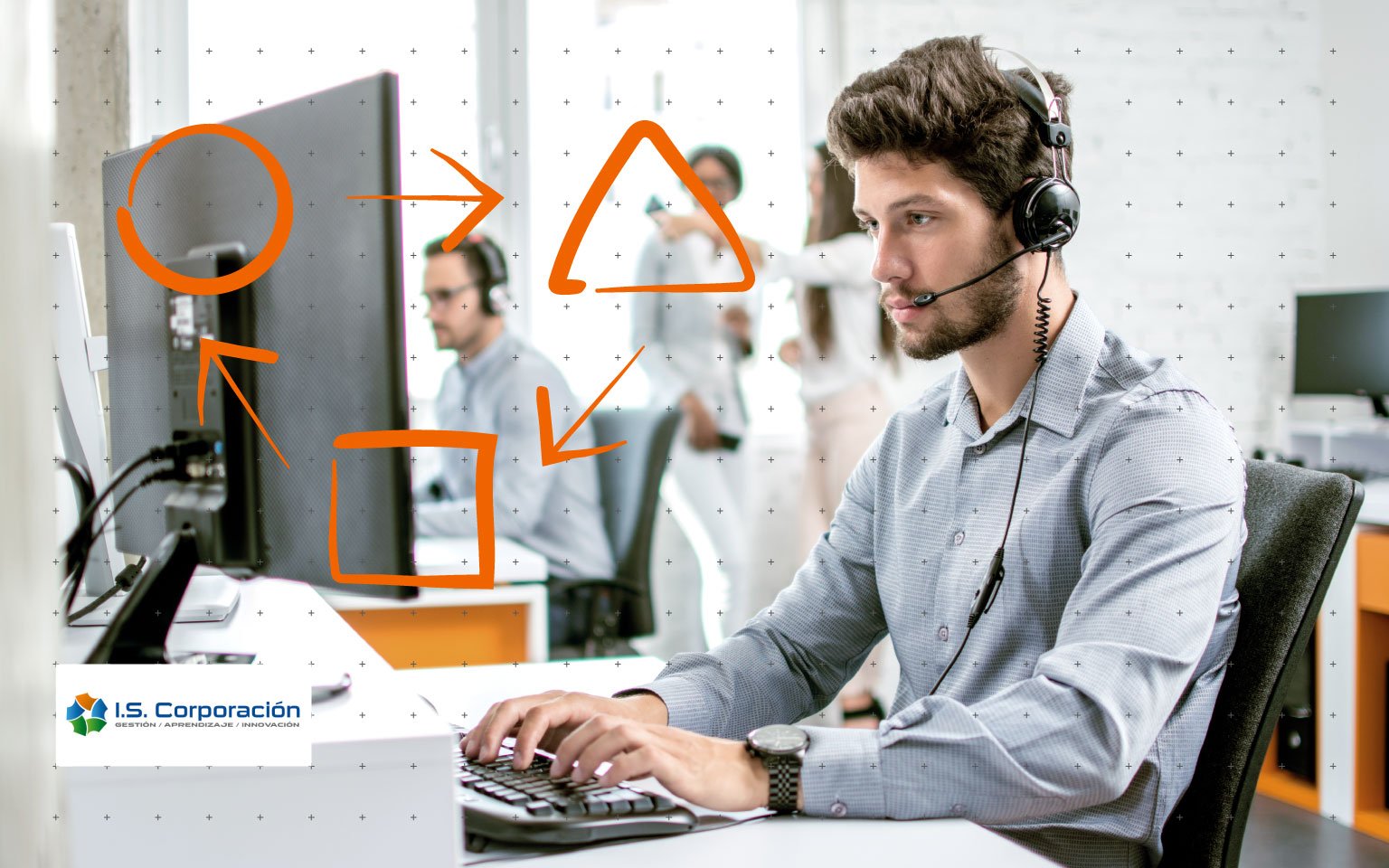 Man with headset in front of computer monitor