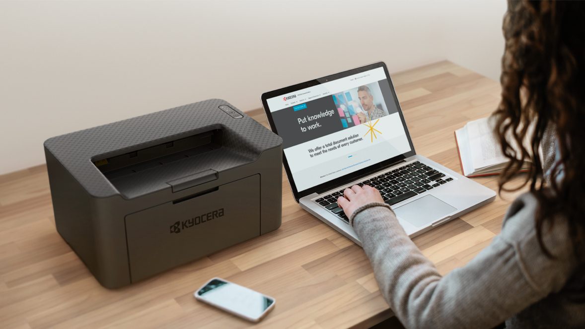 woman with laptop and printer woman with laptop and printer