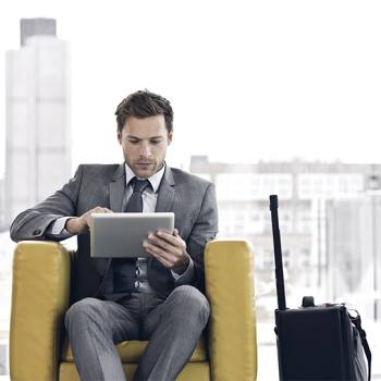 Embrace mobility to drive growth guy sitting in chair